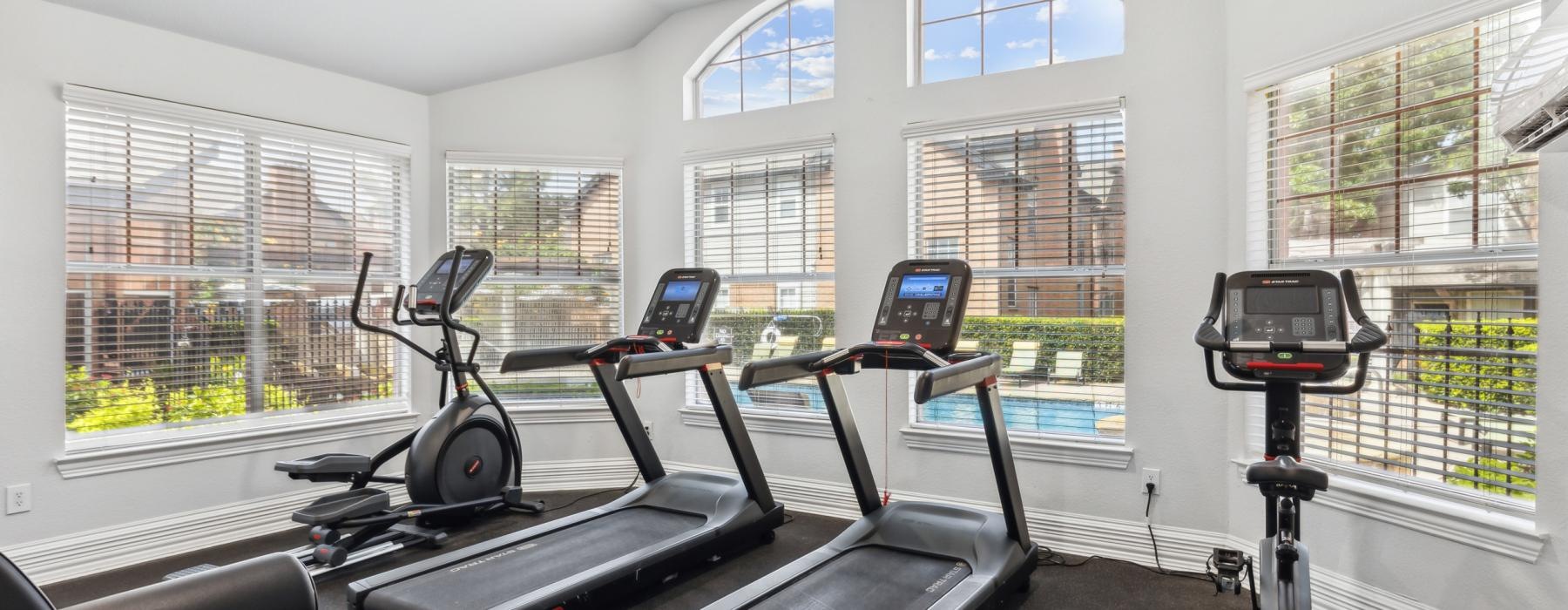 a room with treadmills