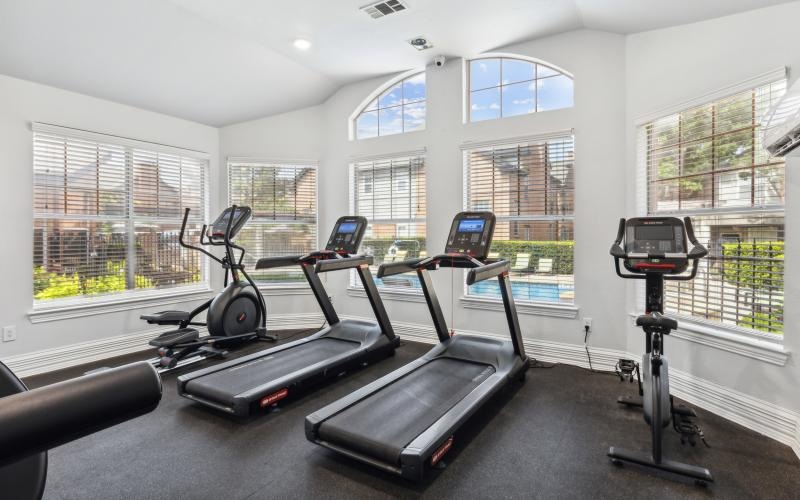 a room with treadmills